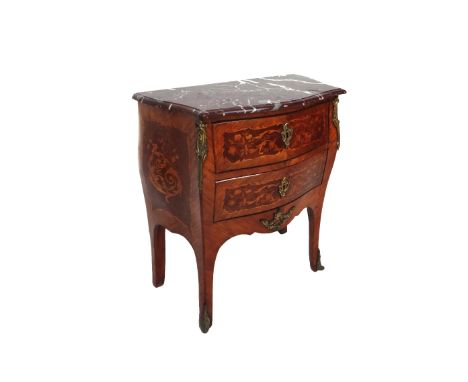 A Louis XV style petite commode, the shaped marble top over a gilt metal mounted marquetry inlaid rosewood bombe two drawer b
