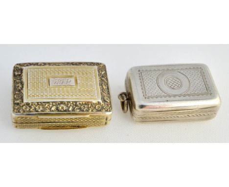 A silver gilt rectangular vinaigrette, with a scroll and foliate pierced grille, the exterior engine turned within floral and