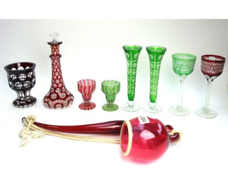 A ruby glass pipe of large proportions, circa 1880, 47cm long, and a group of coloured and cut Bohemian glass including; a pa