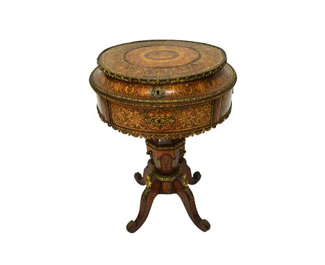 A 19th century French extensively marquetry inlaid gilt metal mounted Kingwood  drum top work table, with fitted interior ove