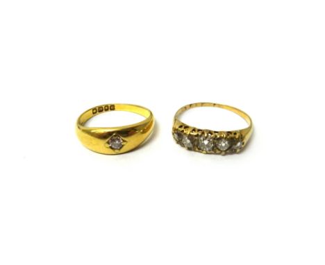 An 18ct gold and diamond five stone ring, mounted with a row of cushion shaped diamonds, ring size O and an 18ct gold ring, g