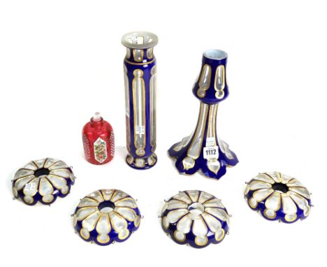 A quantity of parts from a clear and blue glass chandelier, and a cranberry glass scent bottle with foliate decorated enamel 