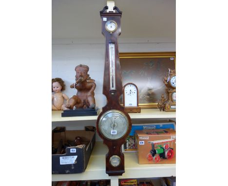 A Regency mahogany cased wheel barometer and thermometer by L. Arnaboldi, London, 97cm high. 