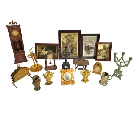 A quantity of vintage dolls house furniture and accessories, mainly metal items, including; mantel clocks, a candelabra, an u