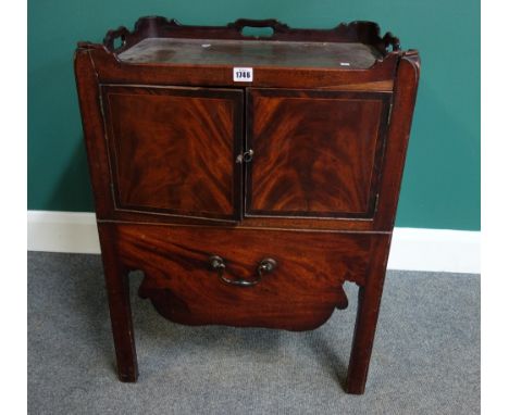 A George III mahogany tray top night commode with pair cupboards over drawer on block supports, 58cm wide. 