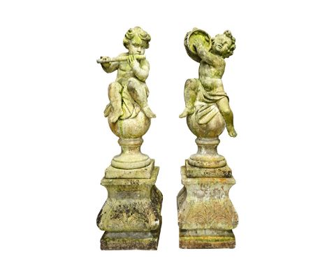 A set of four composition stone figures of cherubs playing instruments sat on a sphere, each on a shaped square plinth, 141cm