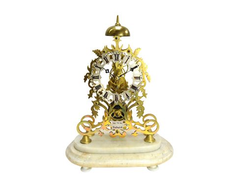 A Victorian brass skeleton timepiece with passing strike retailed by George Christie, Wallingford, C.1870, housed under a gla