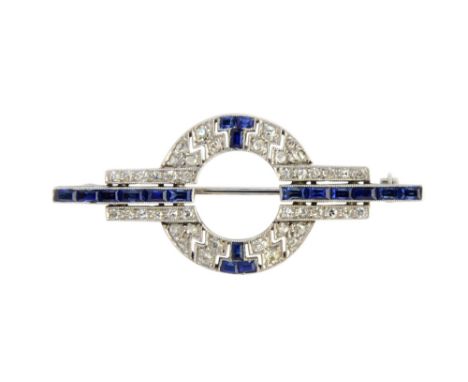 A sapphire and diamond brooch, in a geometric and circular design, mounted with cushion shaped and rose cut diamonds and with