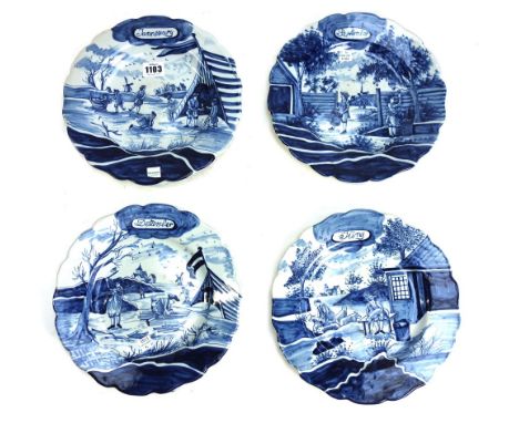 A set of twelve Dutch Delft calendar plates, early 20th century, each decorated with differing landscape or interior scenes a