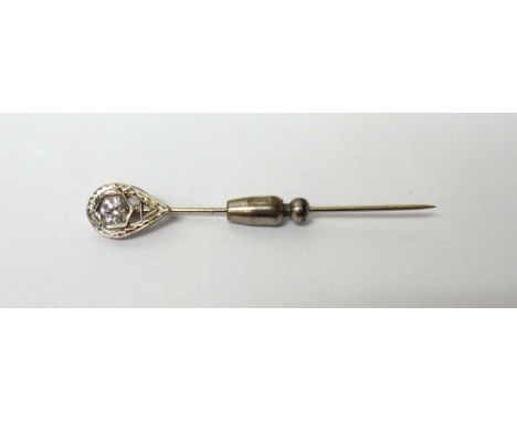 A diamond set stick pin, in a drop shaped design, mounted with a cushion shaped diamond.