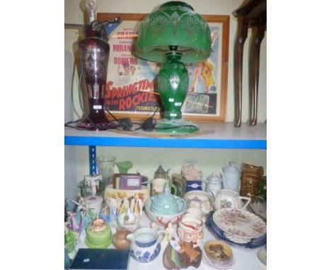 Green and ruby glass table lamps, movie poster, collection of china including figures, glass jugs, etc