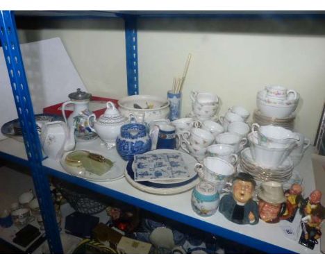 Three Royal Doulton Dickensian figures, Wedgwood and Spode cake plates, three half tea sets, dessert service, cutlery etc