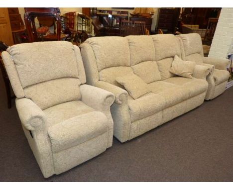 Three piece lounge suite comprising three seater settee, reclining chair and easy chair in light foliate pattern fabric