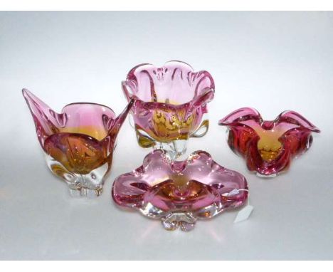 Four pieces of ruby and amber tinted art glass