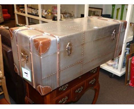 As new aluminium, leather and wood bound trunk
