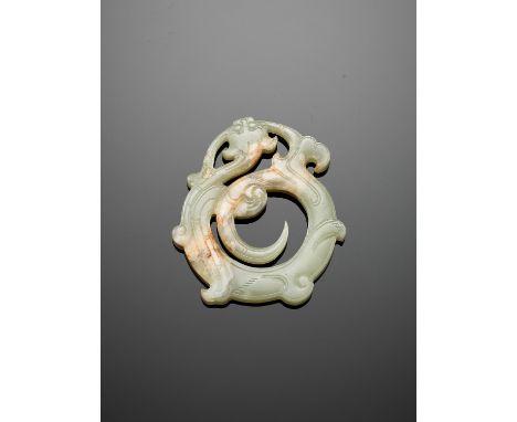 A CELADON JADE 'DRAGON' PENDANT, HUAN, HAN DYNASTYJade. China, Han dynasty, 2nd century BC to 2nd century ADFinely carved as 