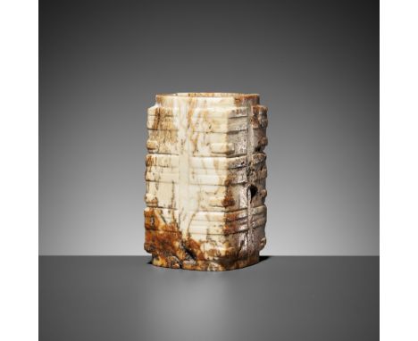 A THREE-TIERED WHITE AND RUSSET JADE CONG, LATE LIANGZHU CULTURE 良渚文化末期白玉琮China, c. 2600-2300 BC. Of square section, each cor