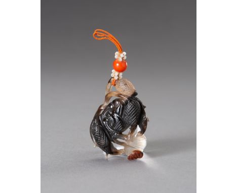 AN AGATE 'CRAB' PENDANT, 18TH CENTURYChina, Qing dynasty (1644-1912), 18th century. Finely carved and pierced to depict a cra