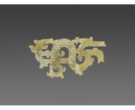 AN EASTERN ZHOU SINUOUS DRAGON CARVING WITH PHOENIX HEADSJade. China, Eastern Zhou, 4th-3rd century BC  This beautiful and co