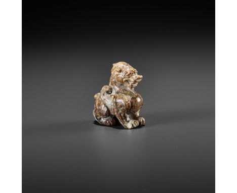 A JADE CARVING OF A BIXIE, SIX DYNASTIESJade. China, Six Dynasties, 3rd-6th century ADThe mythical beast is standing foursqua