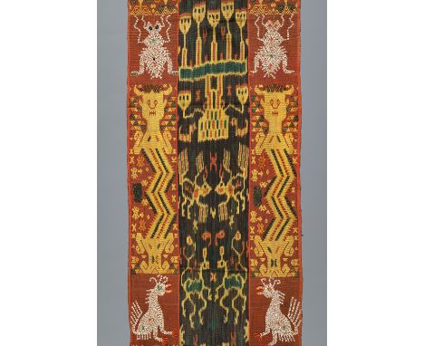 A SUMBA IKAT PANEL WITH SHELL DESIGNSSumba, Indonesia, first half of the 20th century. Crafted from ikat dyed cotton, featuri