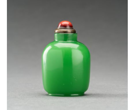 AN APPLE GREEN 'JADE' GLASS SNUFF BOTTLE, QINGChina, late Qing Dynasty (1644-1912). Of rectangular form with rounded sides, r
