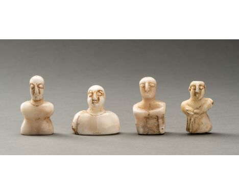 A LOT WITH FOUR BACTRIAN WHITE MARBLE IDOLSBactria-Margiana, circa late 3rd to early 2nd millennium BC. Each carved from milk
