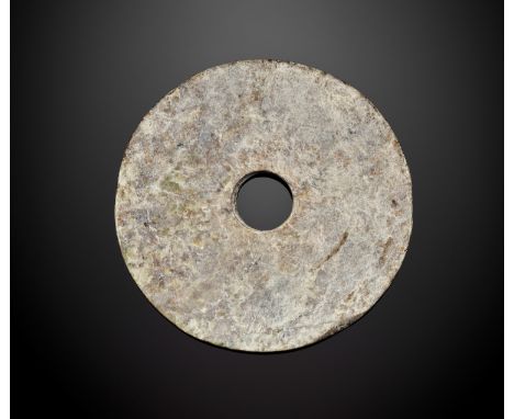 A JADE DISK, BI, LIANGZHU CULTUREJade. China, late Neolithic period, Liangzhu culture, c. 3300-2200 BCOf circular form with a