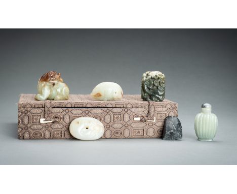 A FINE GROUP OF SIX JADE ITEMSChina, Qing Dynasty (1644-1912) to Republic period (1912-1949) or earlier. The first a carving 