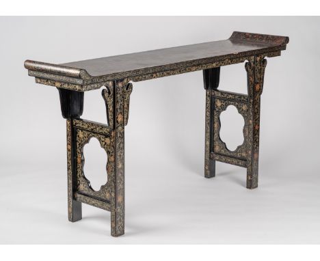 A CHINESE LACQUERED ALTAR TABLE, QINGChina, Qing Dynasty (1644-1912). The long narrow table decorated in red, green, and gold