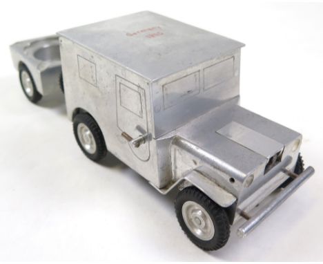 German novelty table lighter in the form of an american Jeep towing a trailer (ashtray), by W. Baier, engraved to top 'German