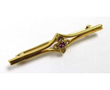 Yellow metal Bar Brooch set with Amethyst and Diamonds weight 4.5 grams 