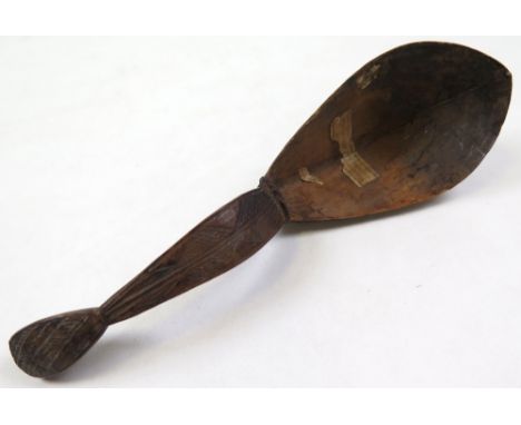 New Zealand interest. Maori spoon circa 1800, hand carved handle, with handwritten label, reads 'New Zealand, Presented by J.
