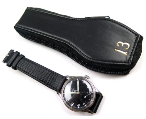 Military issue Omega W. W. W. stainless steel manual wristwatch. The black dial with the broad arrow mark, Arabic numeral mar