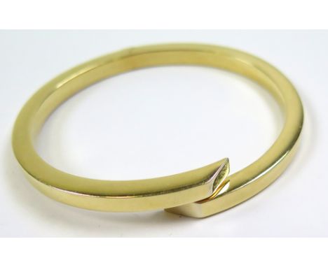Ladies 18ct Gold sprung Bangle weight 21.2 grams