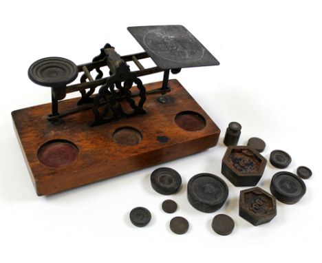 Set of postal scales by S. Morden & Co., London, together with thirteen weights, scales base diameter 11.4cm x 21.5cm approx.