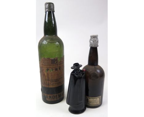 Two large shop display (?) port bottles for Sandeman & Co., circa late 19th to early 20th century, both with original labels 