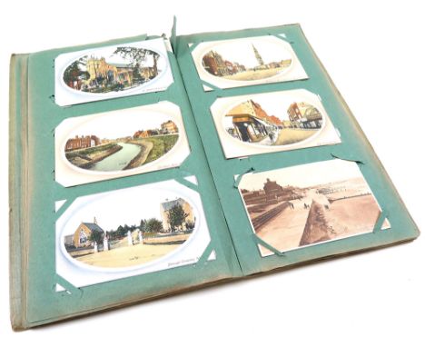 Postcard Album, circa early to mid 20th century, containing approx.seventy postcards, mainly relating to castles, churches an