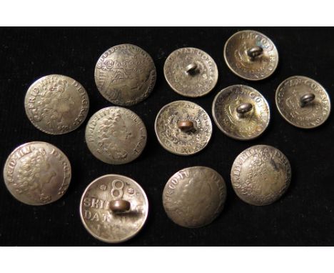 Coin Buttons (12) Danish early 18thC 8 Skilling coins bent convex with a button loop fixed to the back of each.