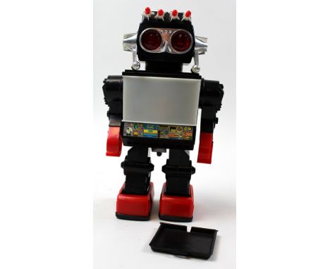 Saturn, the 13" Giant Walking Robot by Kamco, made in China, in original box, hinge to battery compartment broken