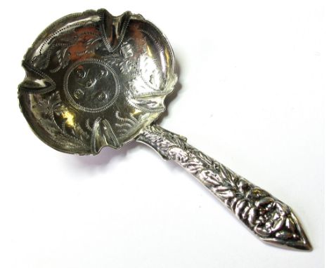 Victorian ornate silver caddy spoon, h'mkd "JW" (Joseph Willmore), " Birmingham, 1845". Weight 6.6gms.