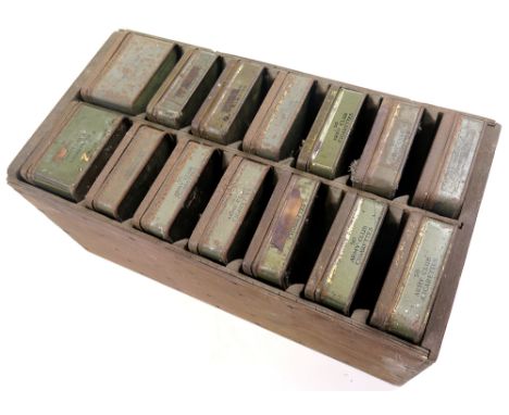 Wooden rack containing fourteen Army Club Sandhurst Size cigarette tins, from an Army mess so that each soldier had their own