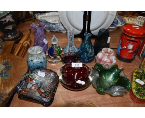 A selection of studio and art glass including mottled and marbled examples
several chips to top rim of purple vase. point mis