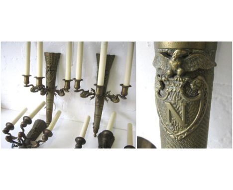 WALL LIGHTS, a set of six, gilt metal each with triple lighting arms supported by swans, quiver and arrow wall plates and emb