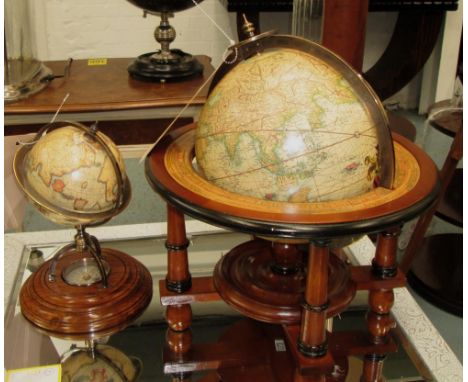 GLOBE, on a wooden frame 31cm H plus a smaller one with compass to base, 20cm H. (2)