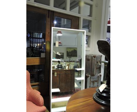 A modern Heals dressing mirror, with deep white painted frame, inset display tiers, H. 183cm.
