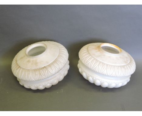 A pair of mid 20th century opaque white glass ceiling light shades, circular with a moulded gadrooned form and egg & dart ban