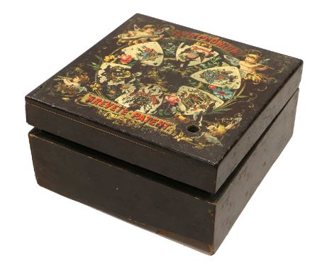 A Symphonion 5.3/4-Inch Disc Manivelle Musical Box with single-section comb and brass spider wheel bar, instruction to lid, i
