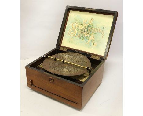 A 10-Inch Symphonion Disc Musical Box Ser. No. 375367, with single comb, titled gilt cast bedplate, grained soundboards, colo