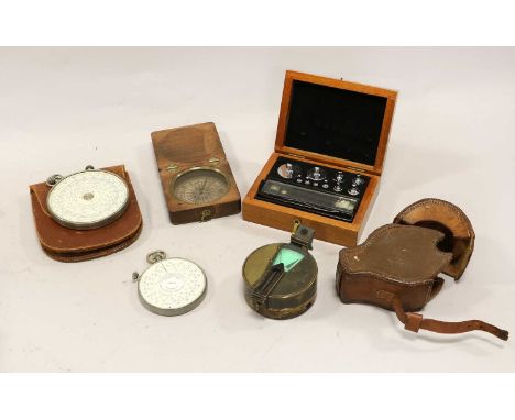Fowler Universal Calculator  in leather case, another smaller example; Watkin Mirror Clinometer, a Compass in wooden case and